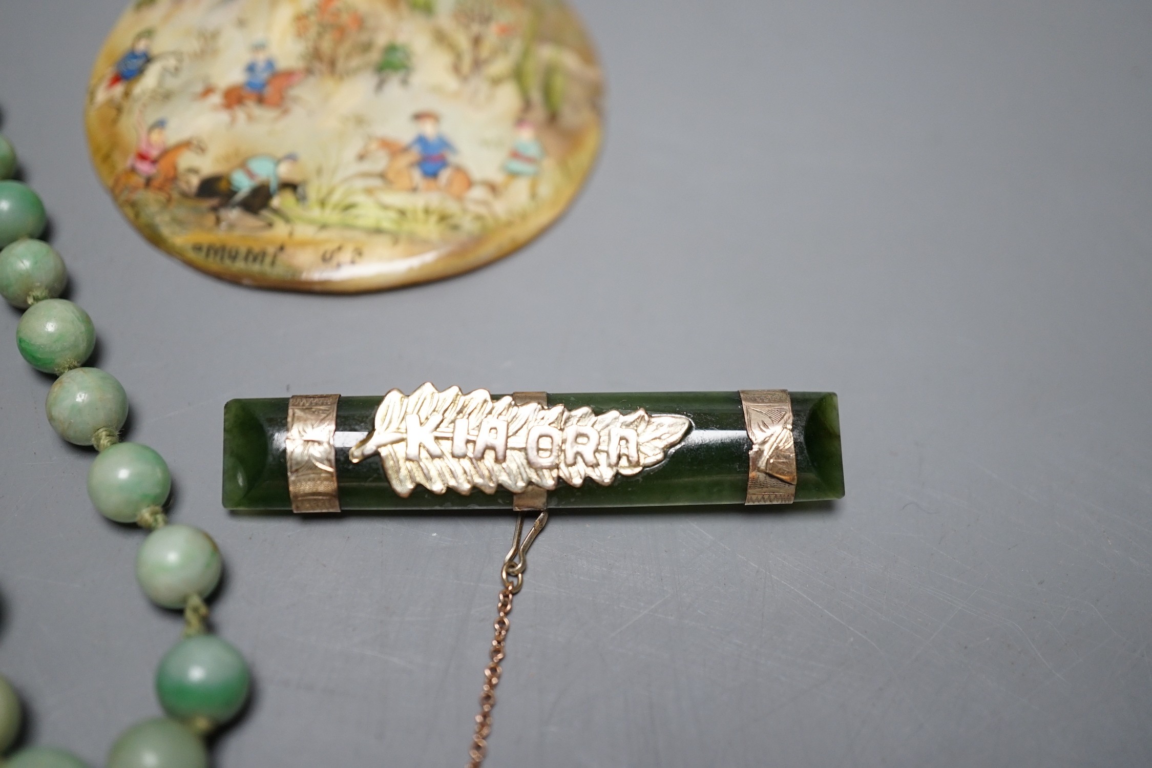 A jade bead necklace, together with a painted pearl pendant and other jade items